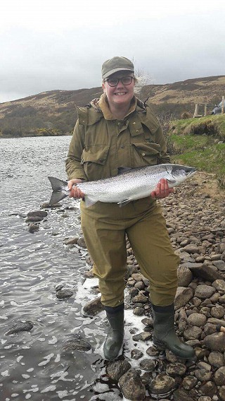 Helen proudly displays her salmon