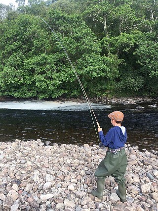 Young lad fishing the Naver
